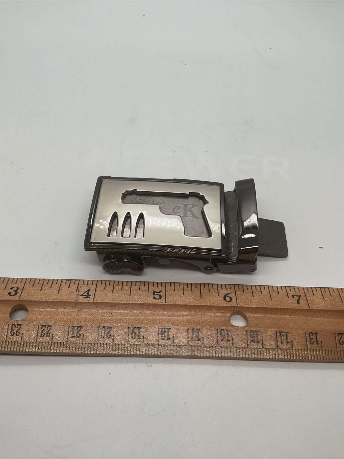 CALVIN KLEIN – Metal Belt Buckle With Gun Cutout – Black & Silver