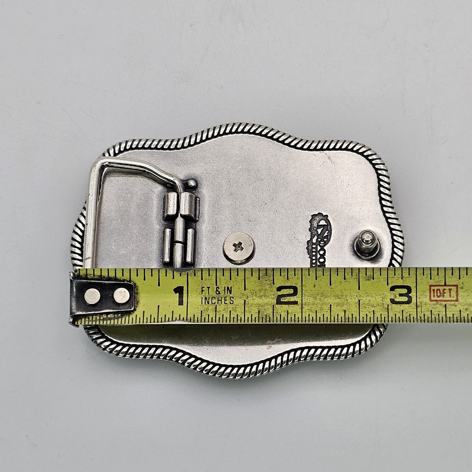 Nocona Western Belt Buckle Bull Rider Rope Edge Rectangular Silver Tone Stars