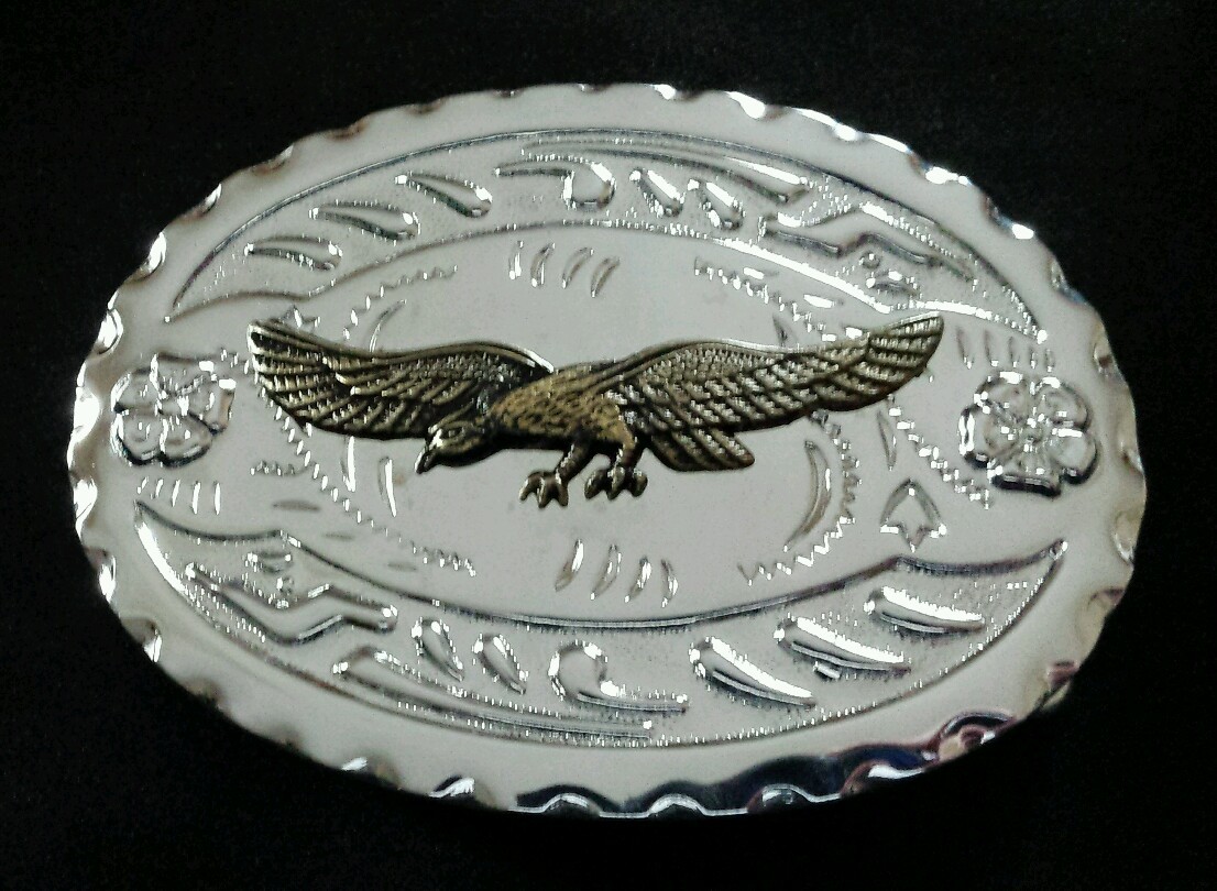 SPREAD WING BRASS TONED EAGLE WESTERN BELT BUCKLE SILVER TONED BACKGROUND