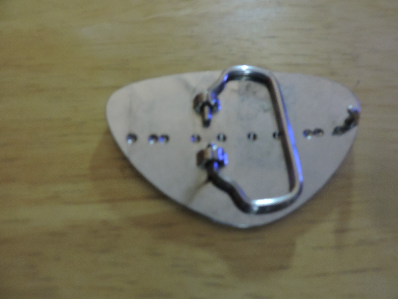 BELT BUCKLE SILVER WITH BLACK DESIGN TRIANGULAR SHAPE 3X2 INCHES