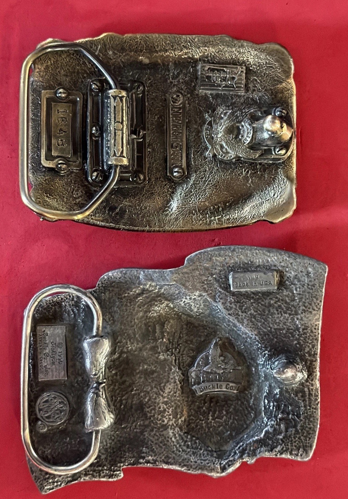 2 belt buckles 1986 American Firefighter, Eagle Flag 1990 Siskiyou Made in USA