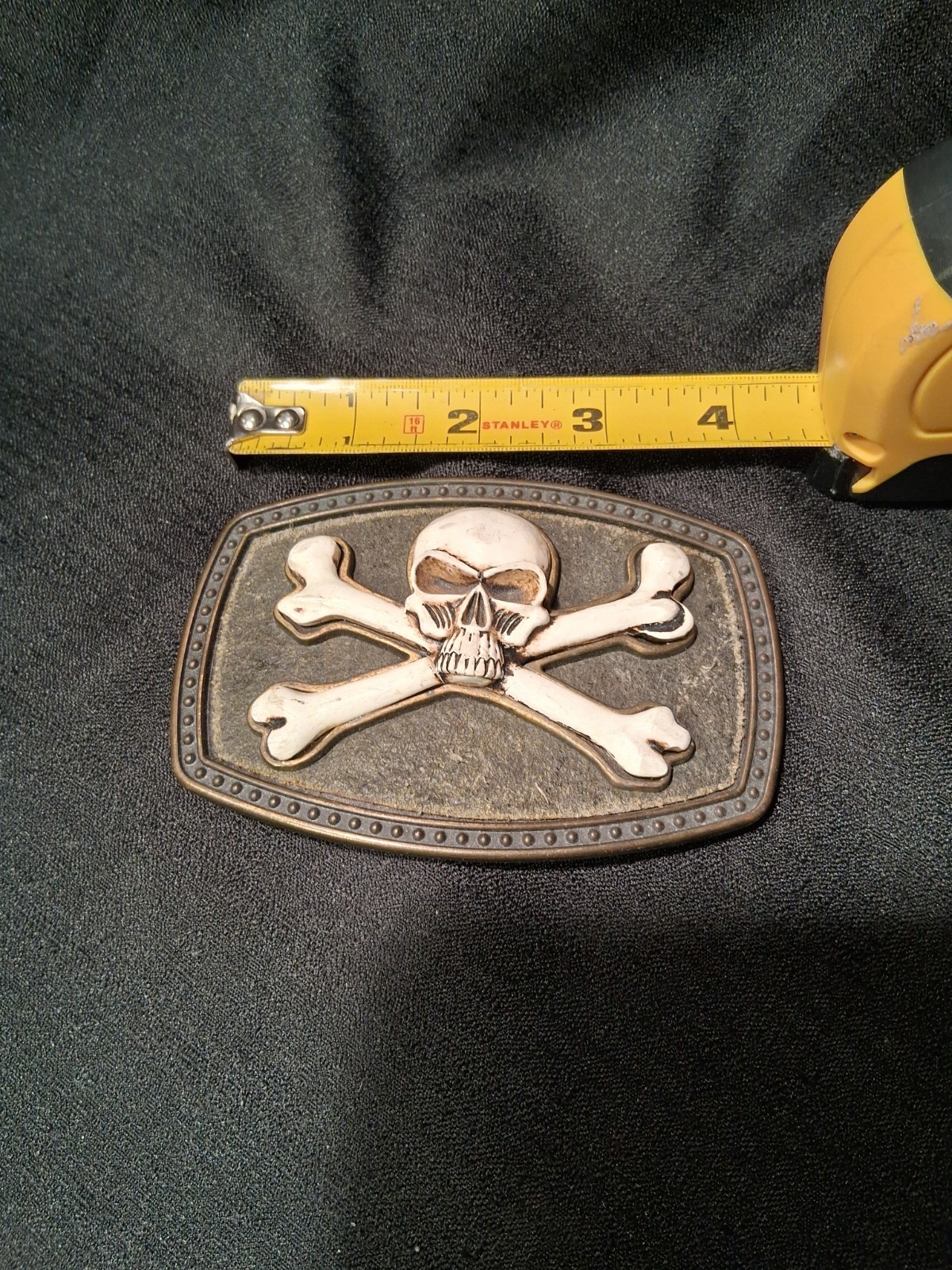 SKULL & CROSSBONES JOLLY ROGER BELT BUCKLE W/ RAISED SKULL & BONES 41/2 BY 3 IN
