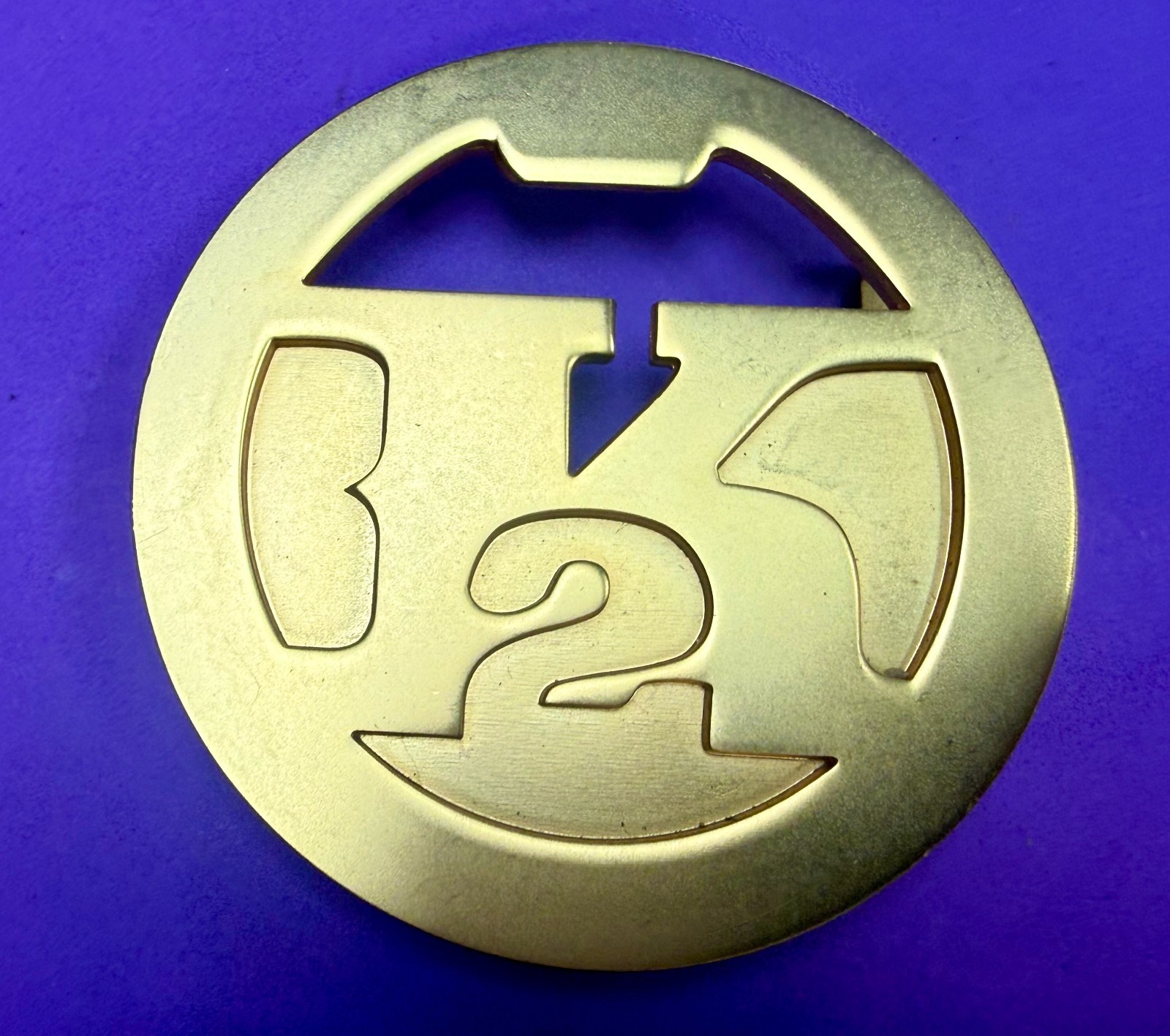 K2 Saloon by Kirschner Limited Edition Sarsaparilla Outlaw Opener & Belt Buckle