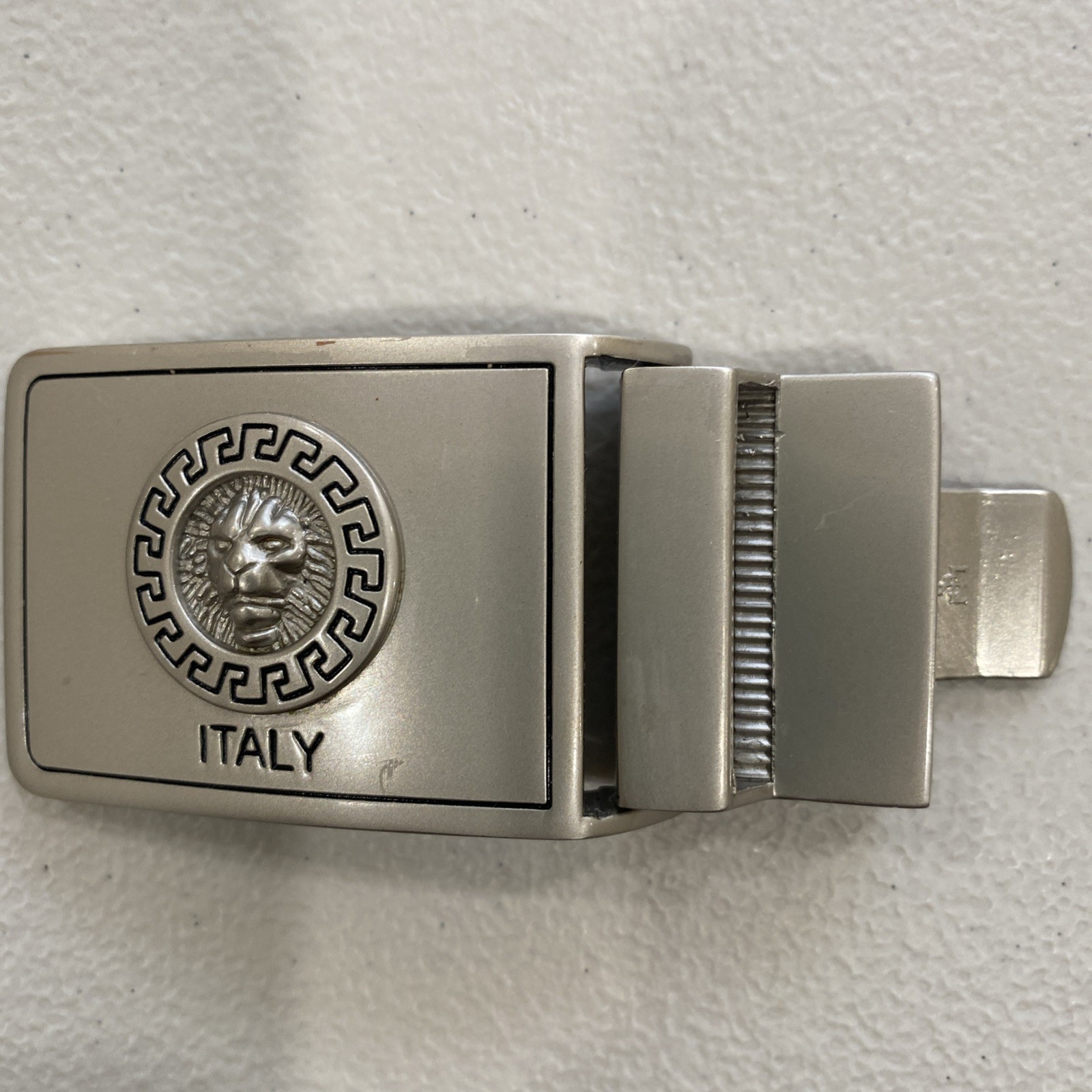 Belt Buckle Marked “Italy” Lion Face In Round, Scrolled Circle