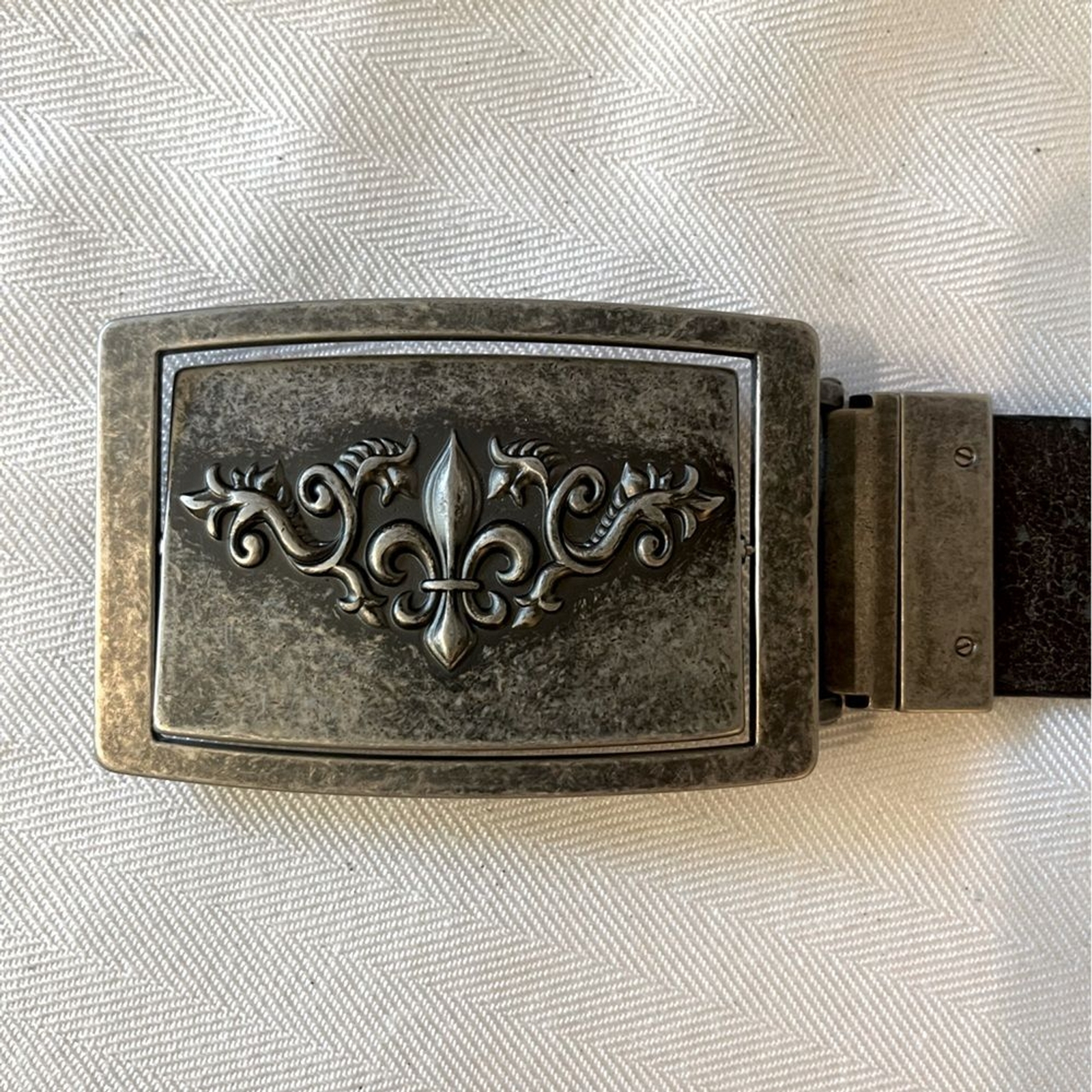 Fleur de Lis reversible pewter type belt buckle. Monogram M on the reverse side
