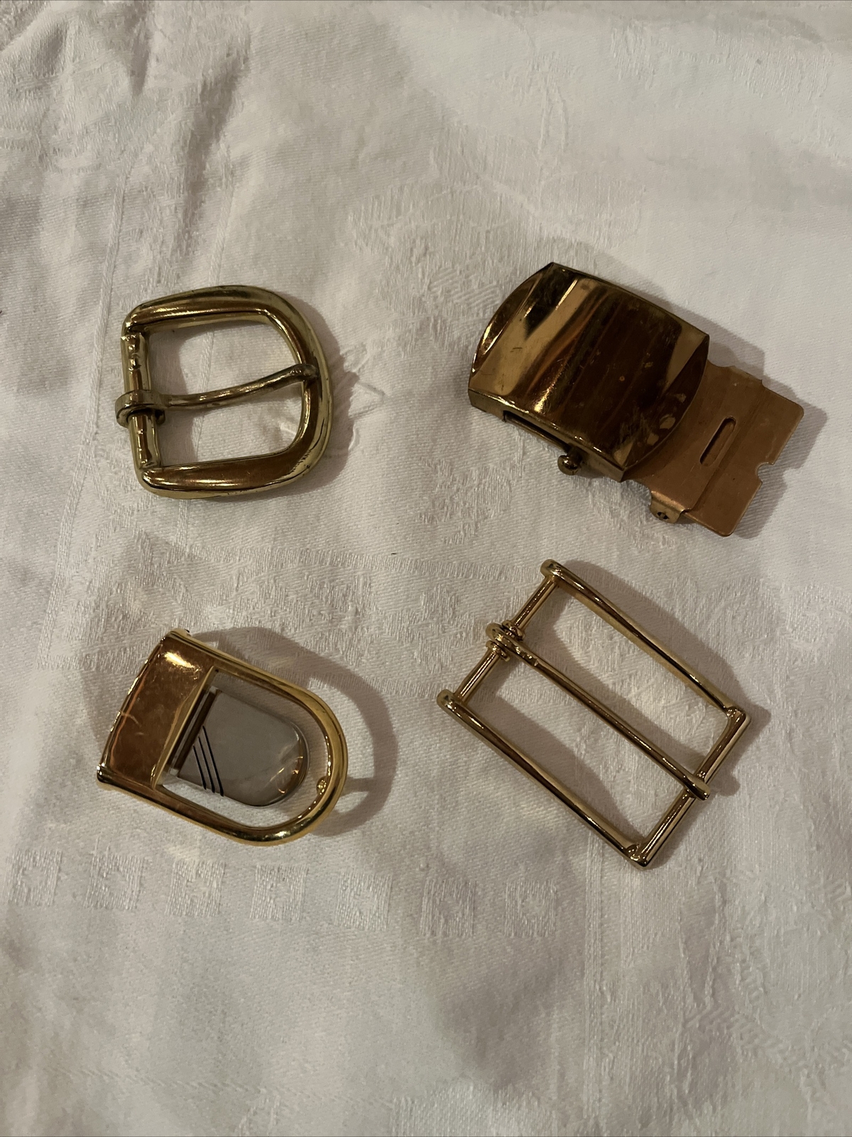 set of 4 mixed metal belt buckles