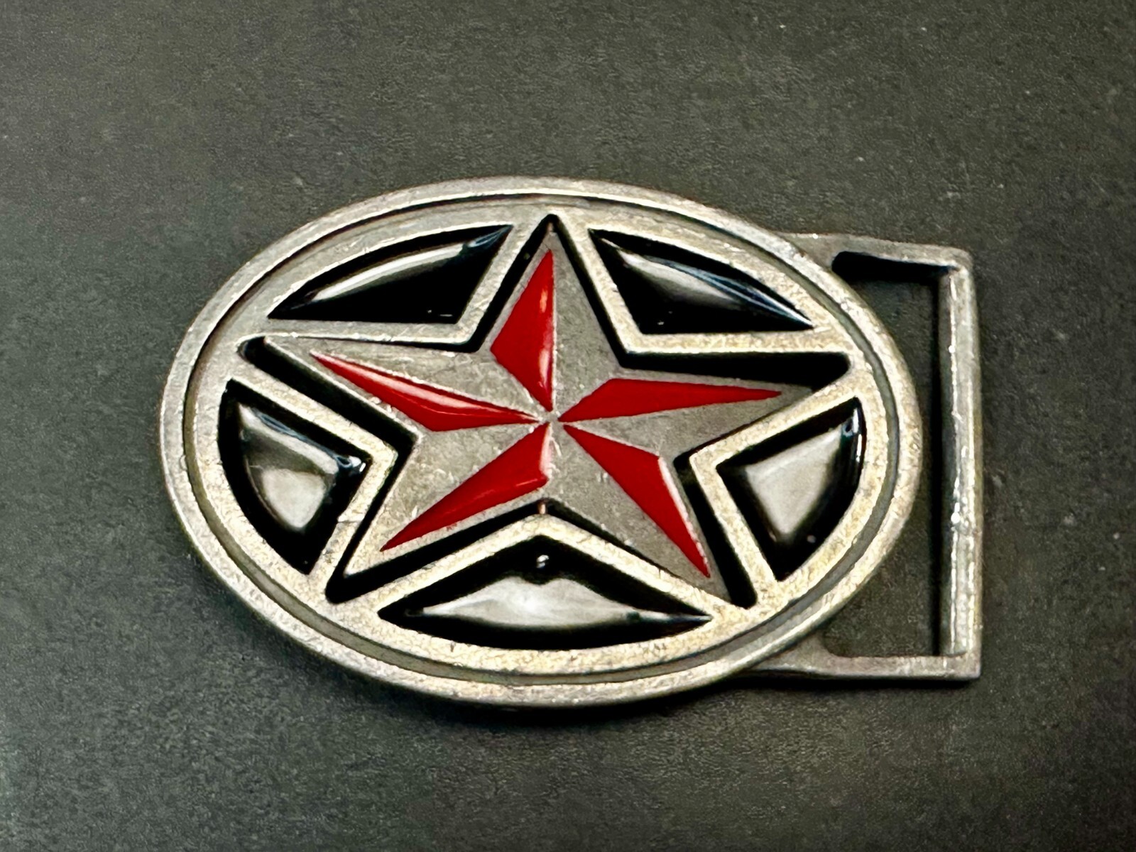 Moving Reversible Star (Red or Black) Belt Buckle by Heavy Metal Manufacturing