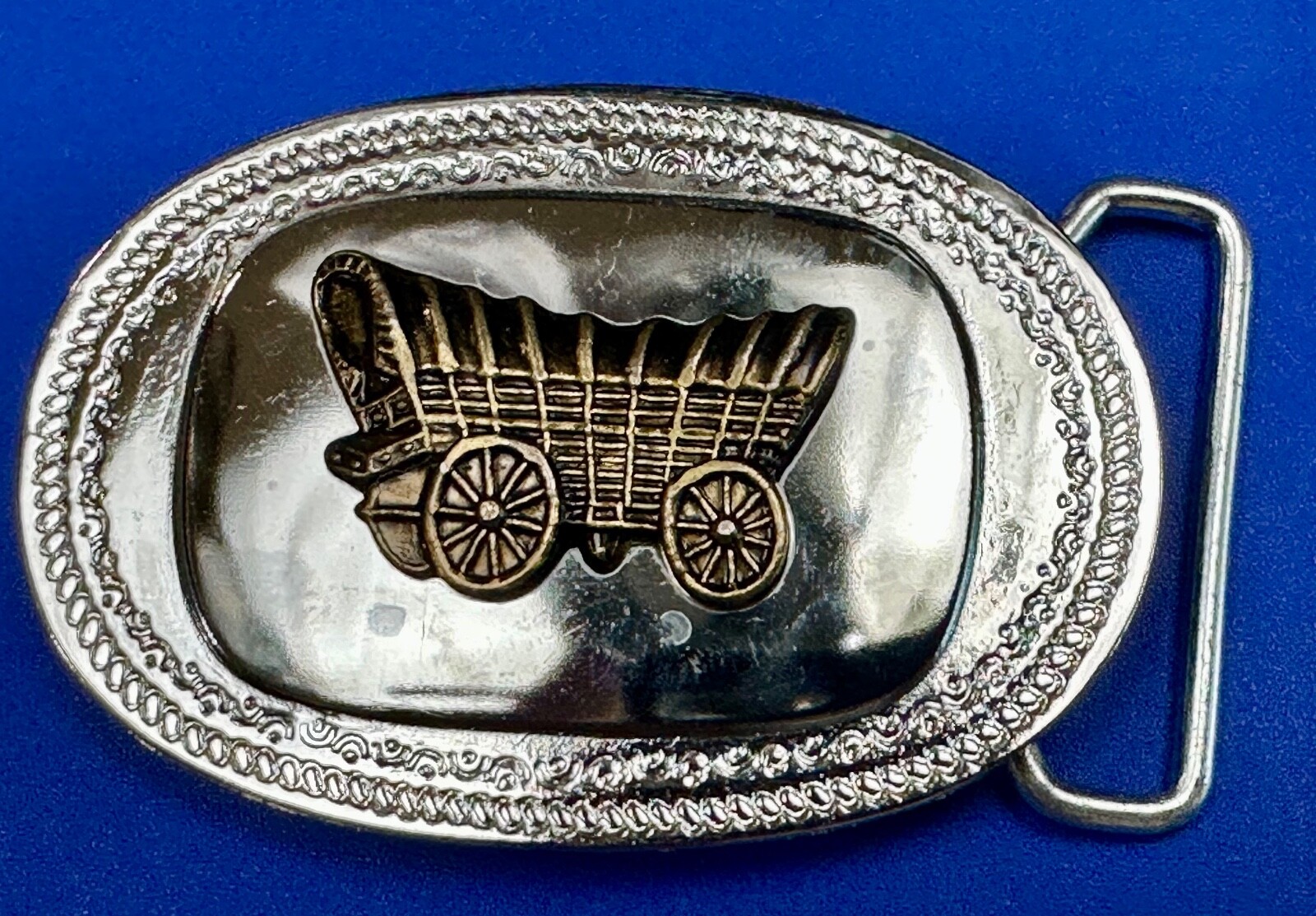 Vintage Covered Wagon On Reflective Oval Two Tone Western Belt Buckle