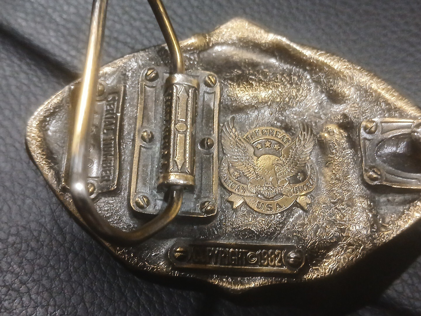 The Great American Belt Buckle Co 1982 Football Serialized solid Brass Enameled