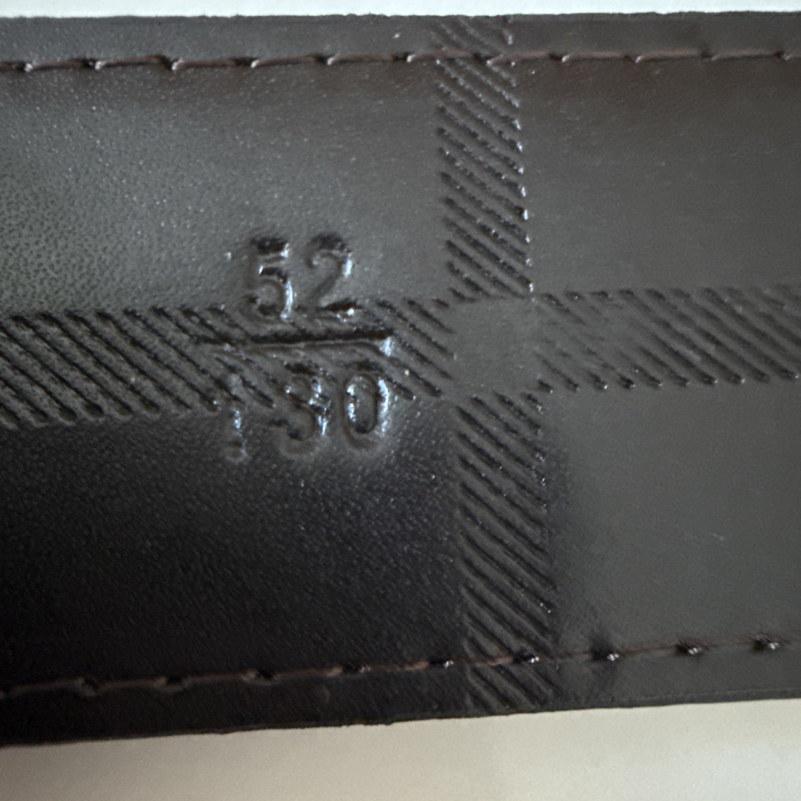 Burberry reversible belt in sand tone. polished metal buckle