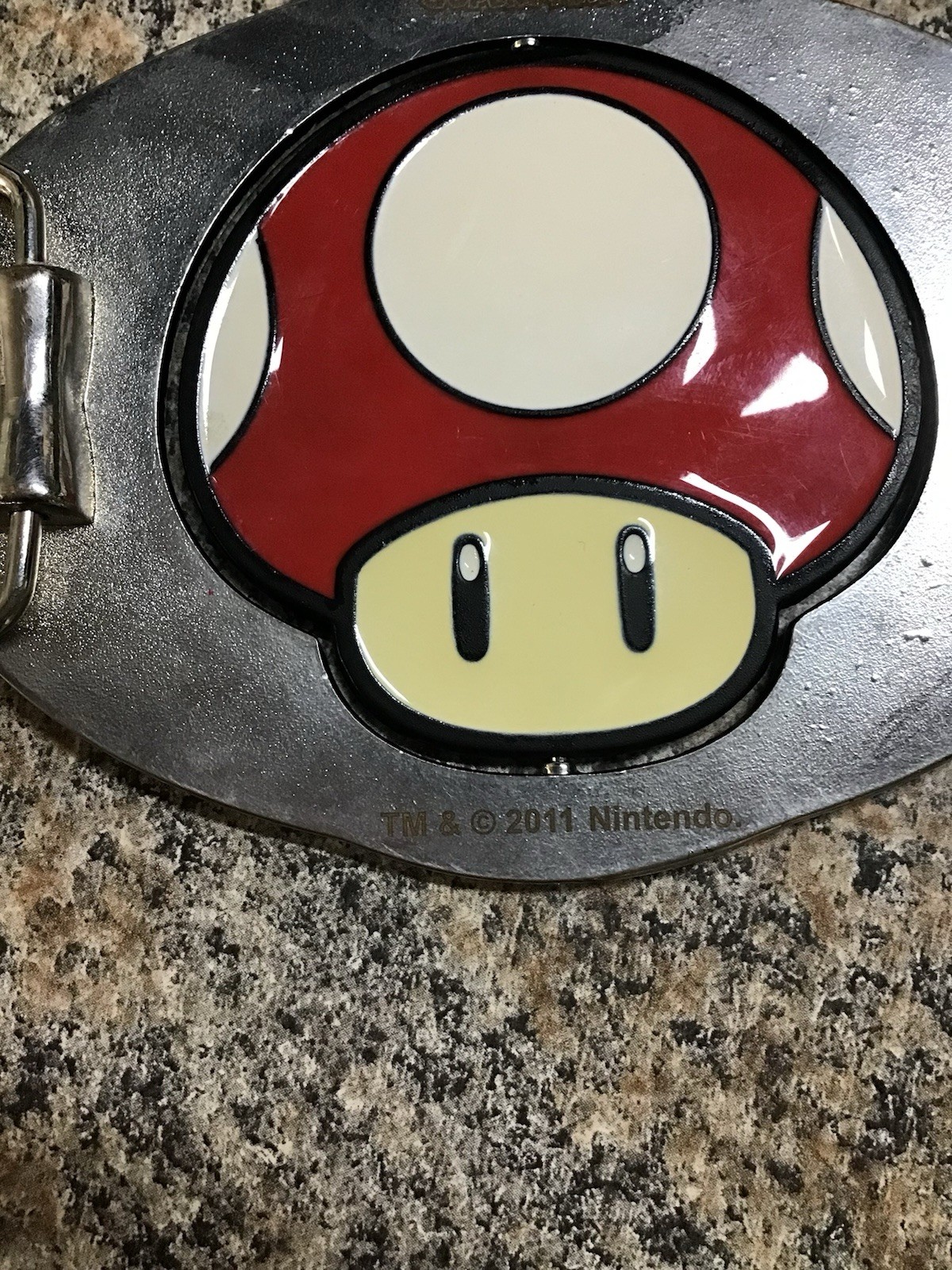 2011 Nintendo Super Mario Brothers reversible red green mushroom belt buckle
