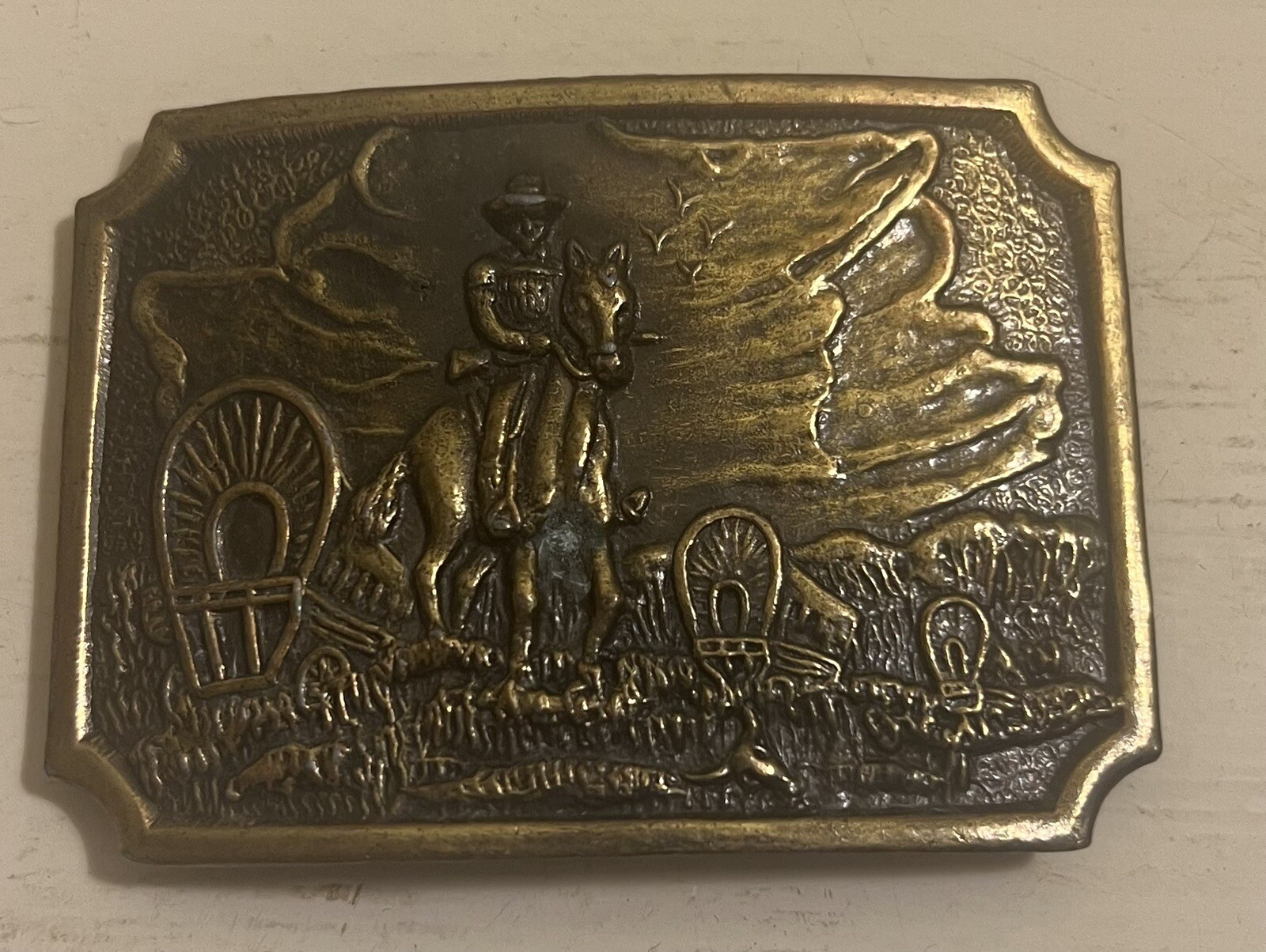 Belt Buckle With A Man And A Horse On It