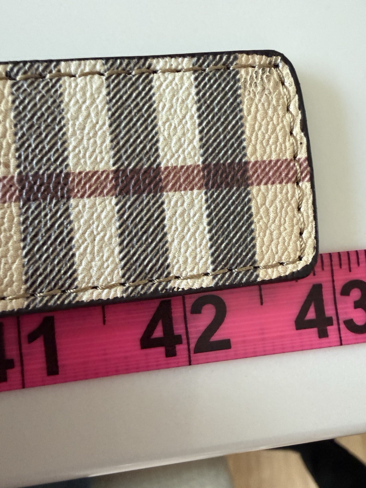Burberry reversible belt in sand tone. polished metal buckle of the Equestrian