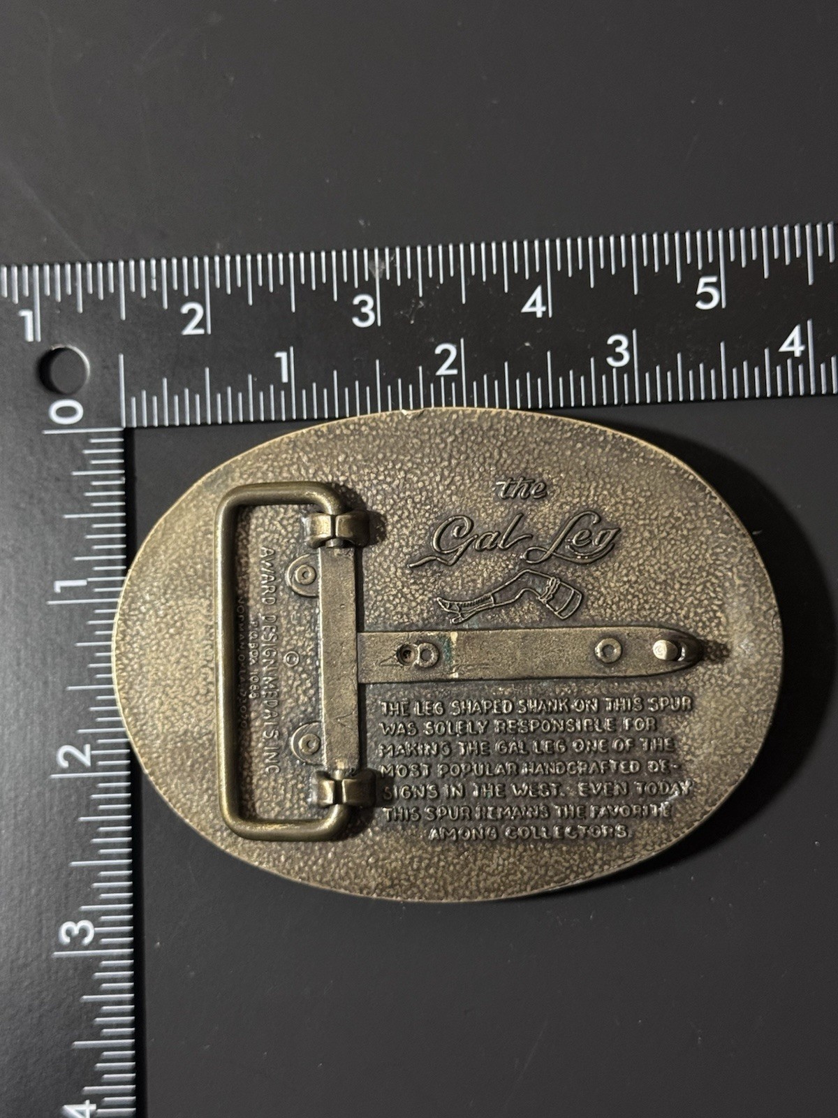 Vintage The Gal Leg Spinning Roulette Wheel Belt Buckle