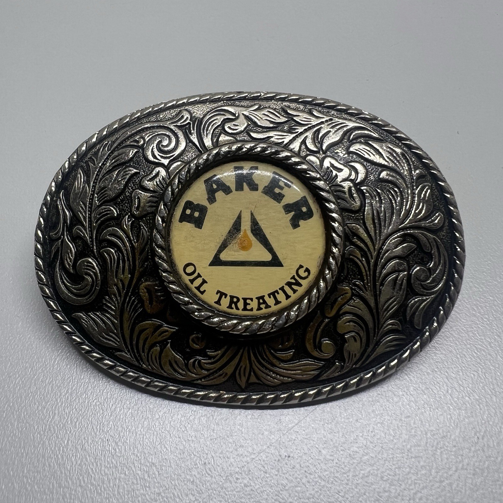 Baker Oil Treating Belt Buckle Vintage Western Floral Oval Silver Tone
