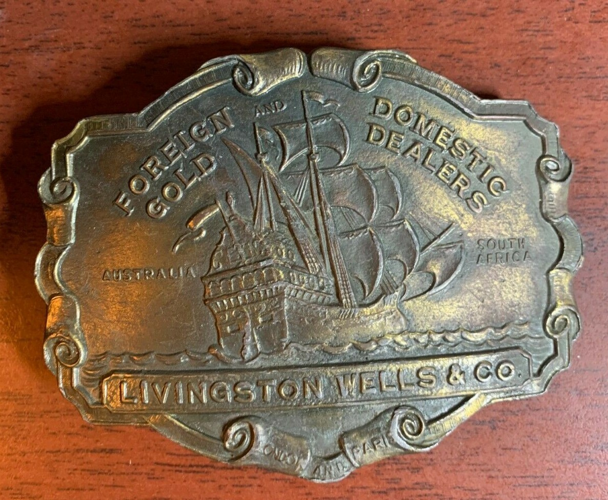 Vintage Livingston Wells Co. Foreign & Domestic Gold Dealers Belt Buckle Boat