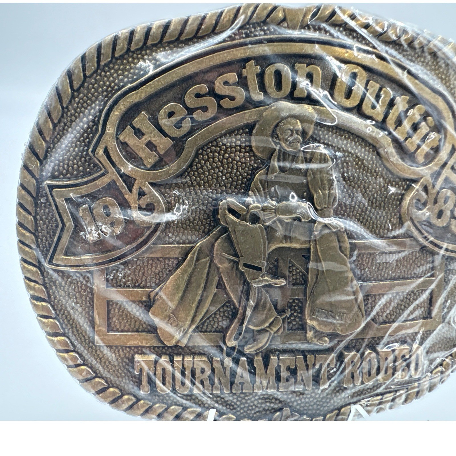 Hesston 1985 Tournament Rodeo Belt Buckle Vintage NFR Collectible Bronze Tone