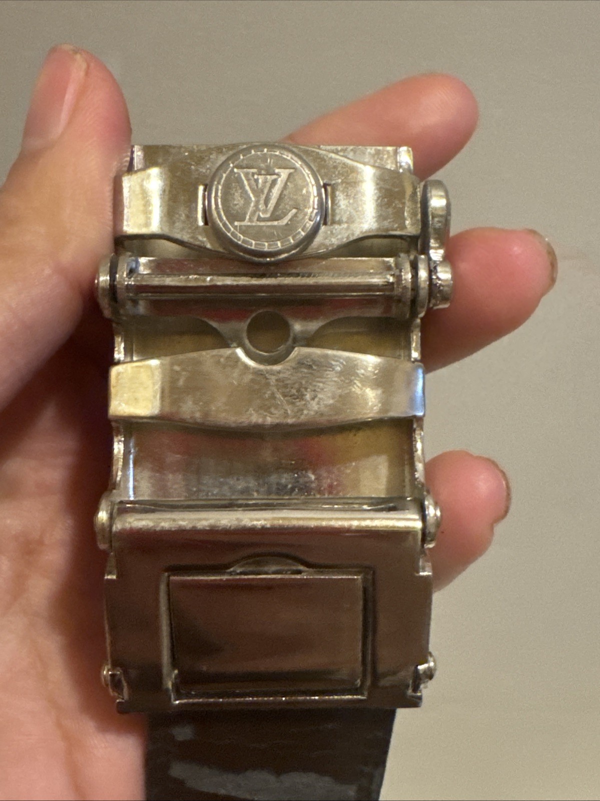 rare Louis Vuitton Belt Buckle Cellphone.