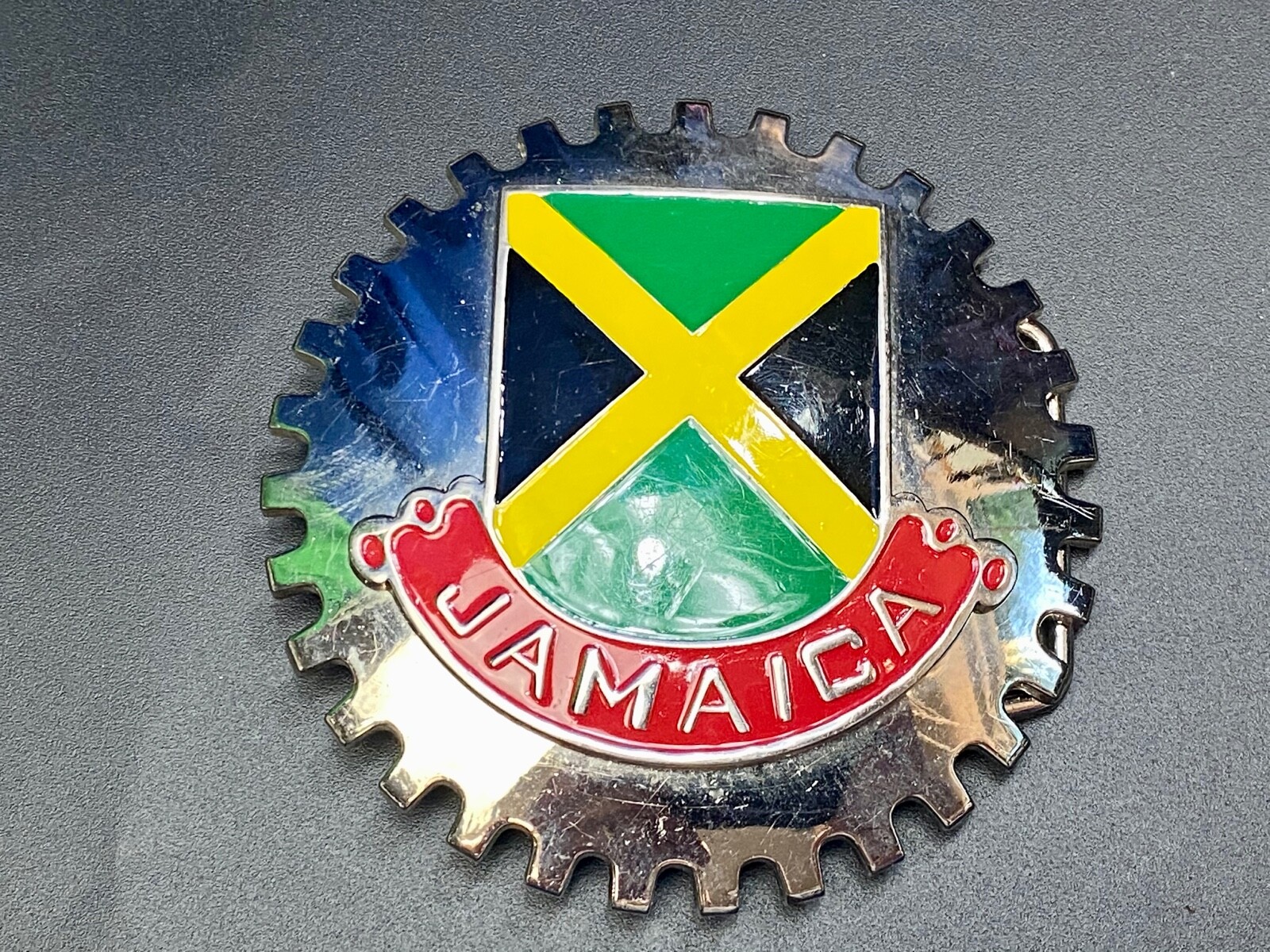Jamaica Flag colors on Lg. silver color GEAR SHAPED SHIELD BELT BUCKLE ARTIFAKT