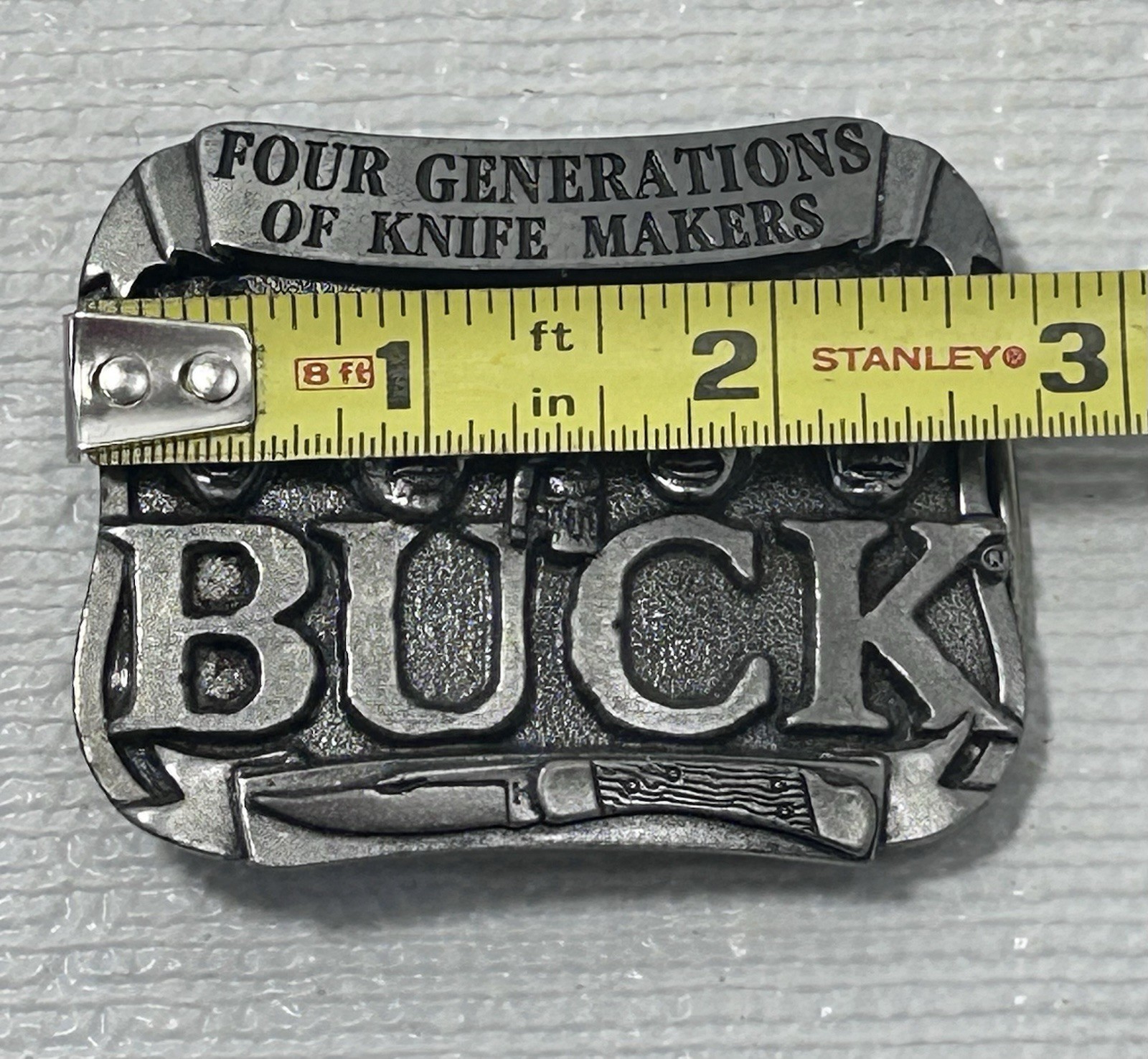 Buck Knives Belt Buckle Four Generations Of Knife Makers Pewter Smoky MT. Knife