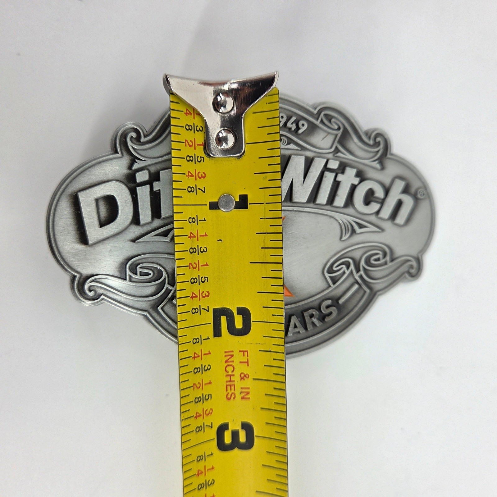 Ditch Witch Construction 75 Year Anniversary Belt Buckle Metal Logo Collectible