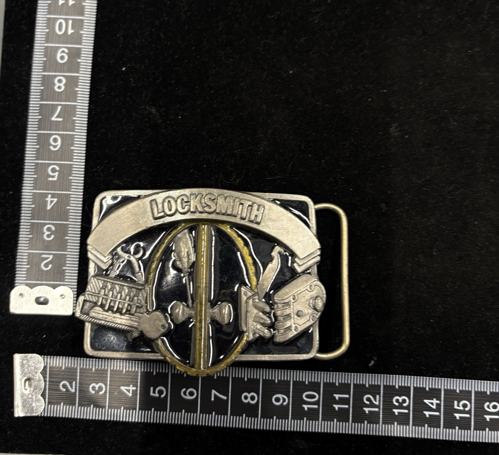Vintage silver and black locksmith-themed belt buckle features a LOCKSMITH RARE