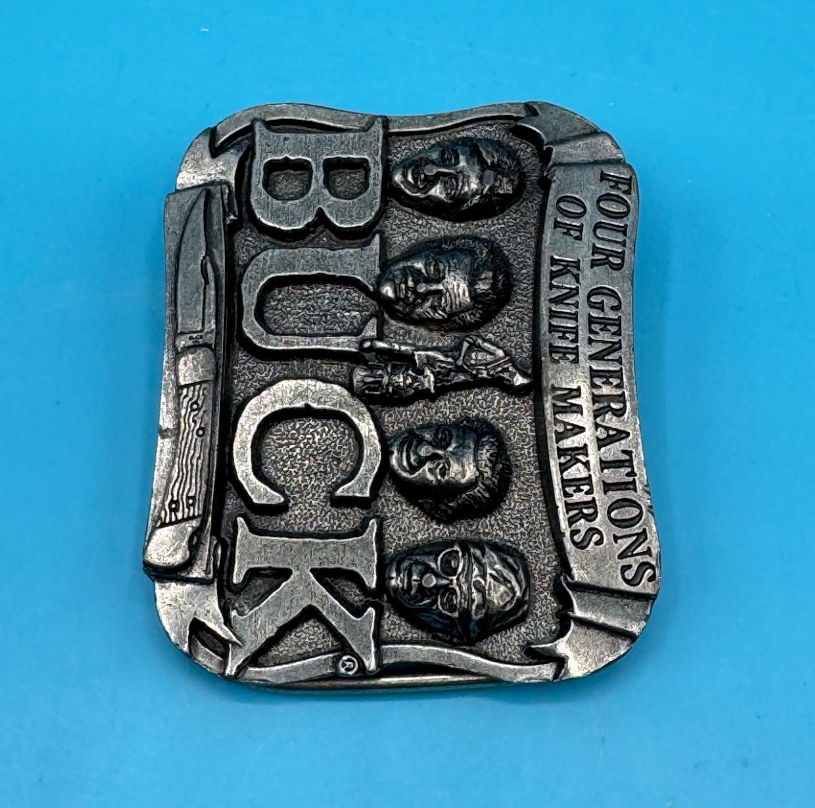 VINTAGE **FOUR GENERATIONS OF KNIFE MAKERS – BUCK KNIVES** BELT BUCKLE