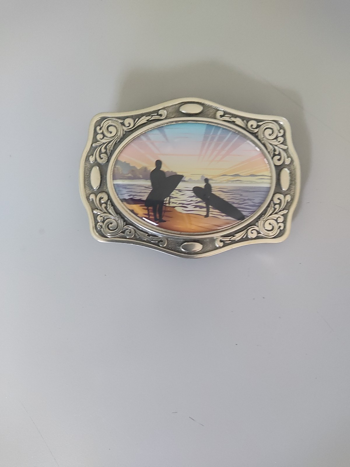 New Belt Buckle Featuring a Surfer