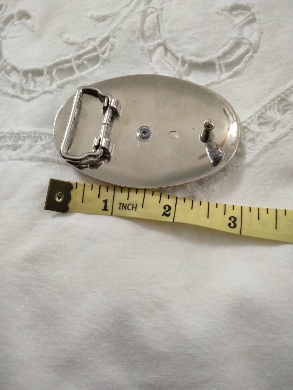 Bucking bronco belt buckle silver tone