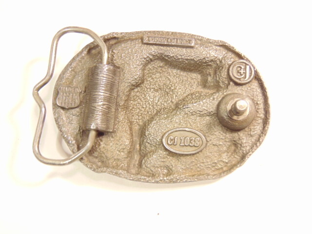 heavy older enameled buckle showing a leaping fish; CJ Inc., 1986, Made in USA
