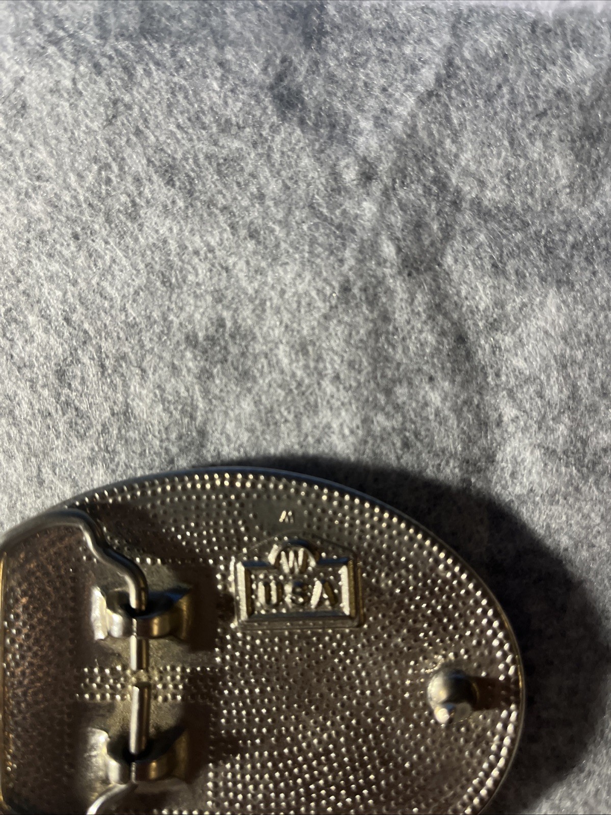 Silver-toned Belt Buckle with Black Enamel and Flying Eagle. Made in USA.