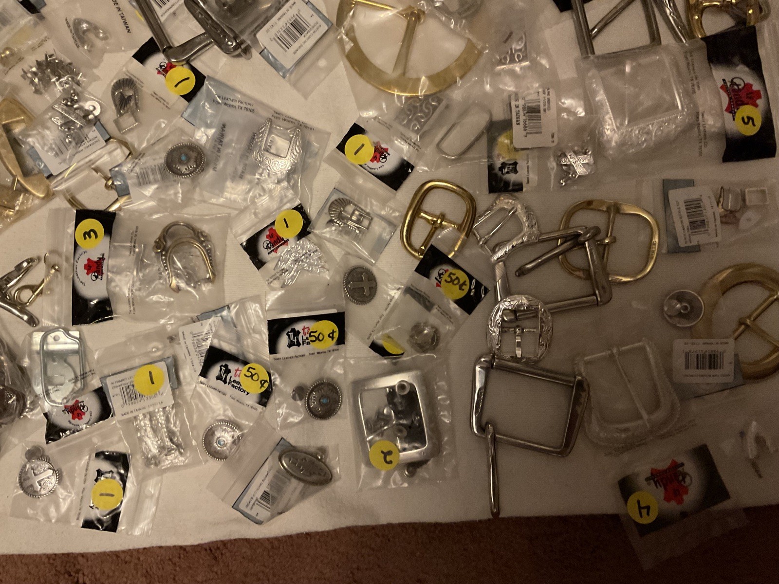 LOT OF 200 ITEMS: BUCKLES/ADDITIONAL ITEMS- VARIOUS STYLES AND DESIGNS – BOX 1