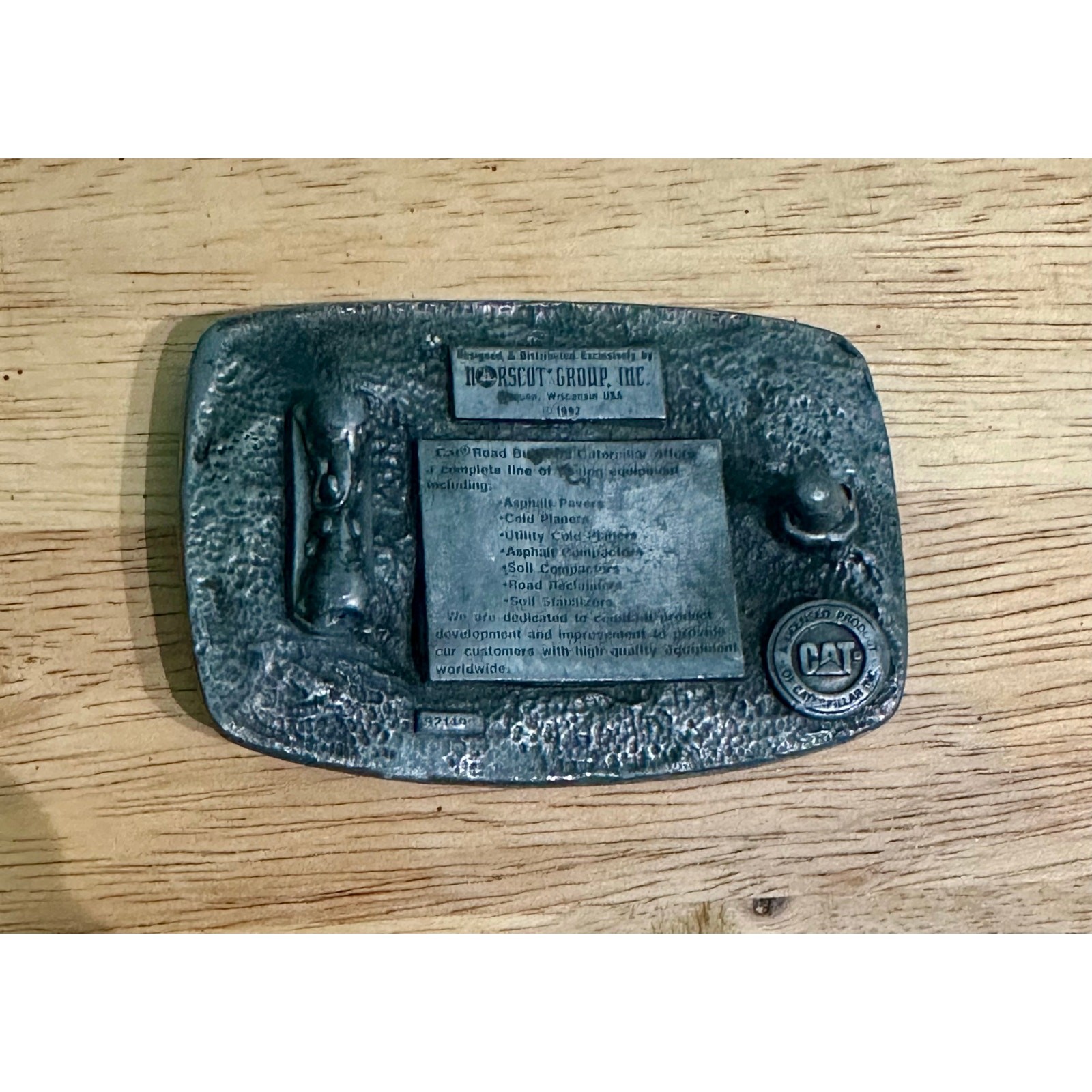Vintage 1992 Caterpillar CAT Road Builders Belt Buckle Norscot Group Inc Pewter
