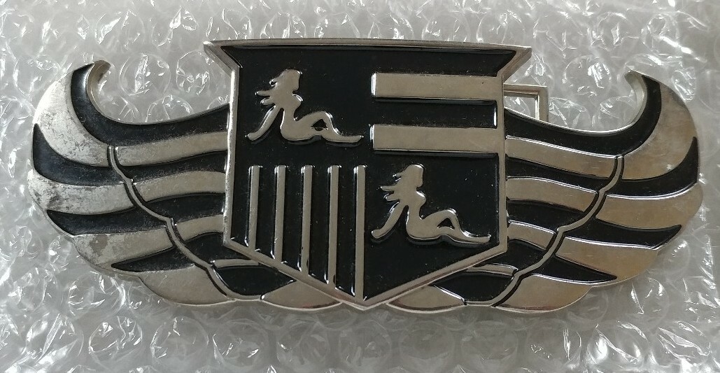 WINGS SHIELD MUD FLAP GIRL CREST BOTTLE OPENER BELT BUCKLE PRONG NEEDS REPAIR