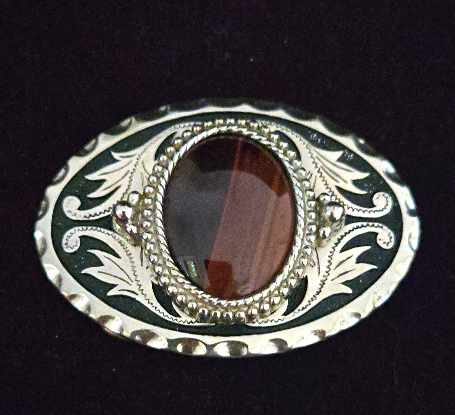 Western oval belt buckle silver/black floral w/ brown stone 1.5 in