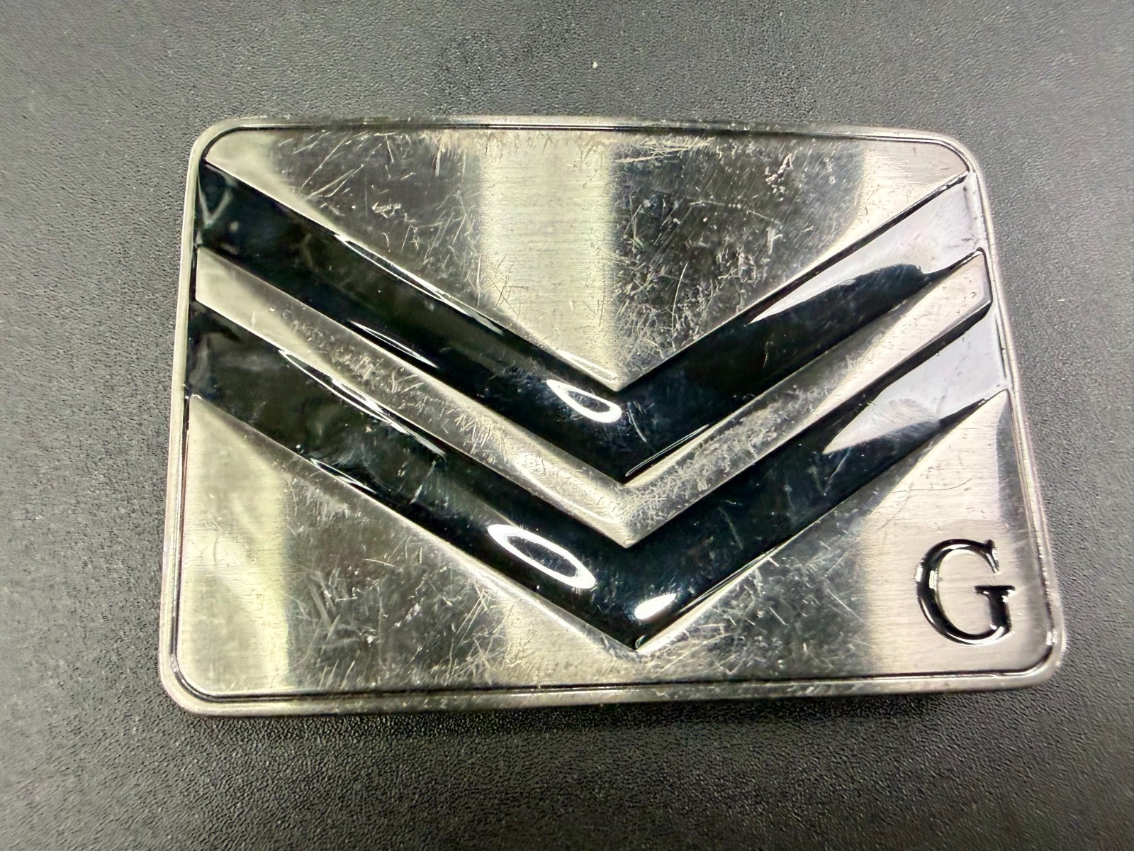 Two Stacked Chevron Shapes? Black Enamel Stripes G Letter Belt Buckle