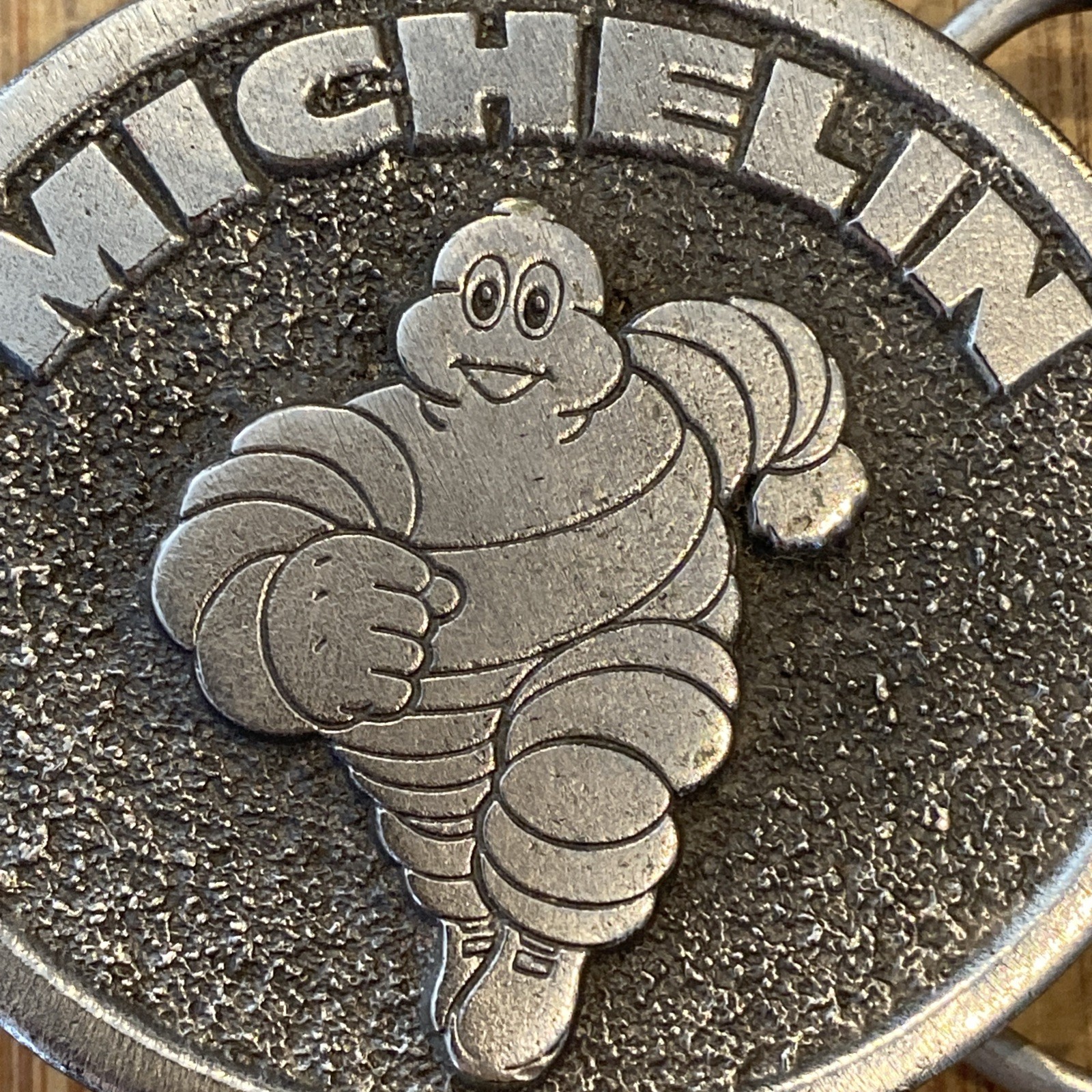 VINTAGE 80’s Michelin Man Tire Belt Buckle Made In USA, Great American Buckle Co