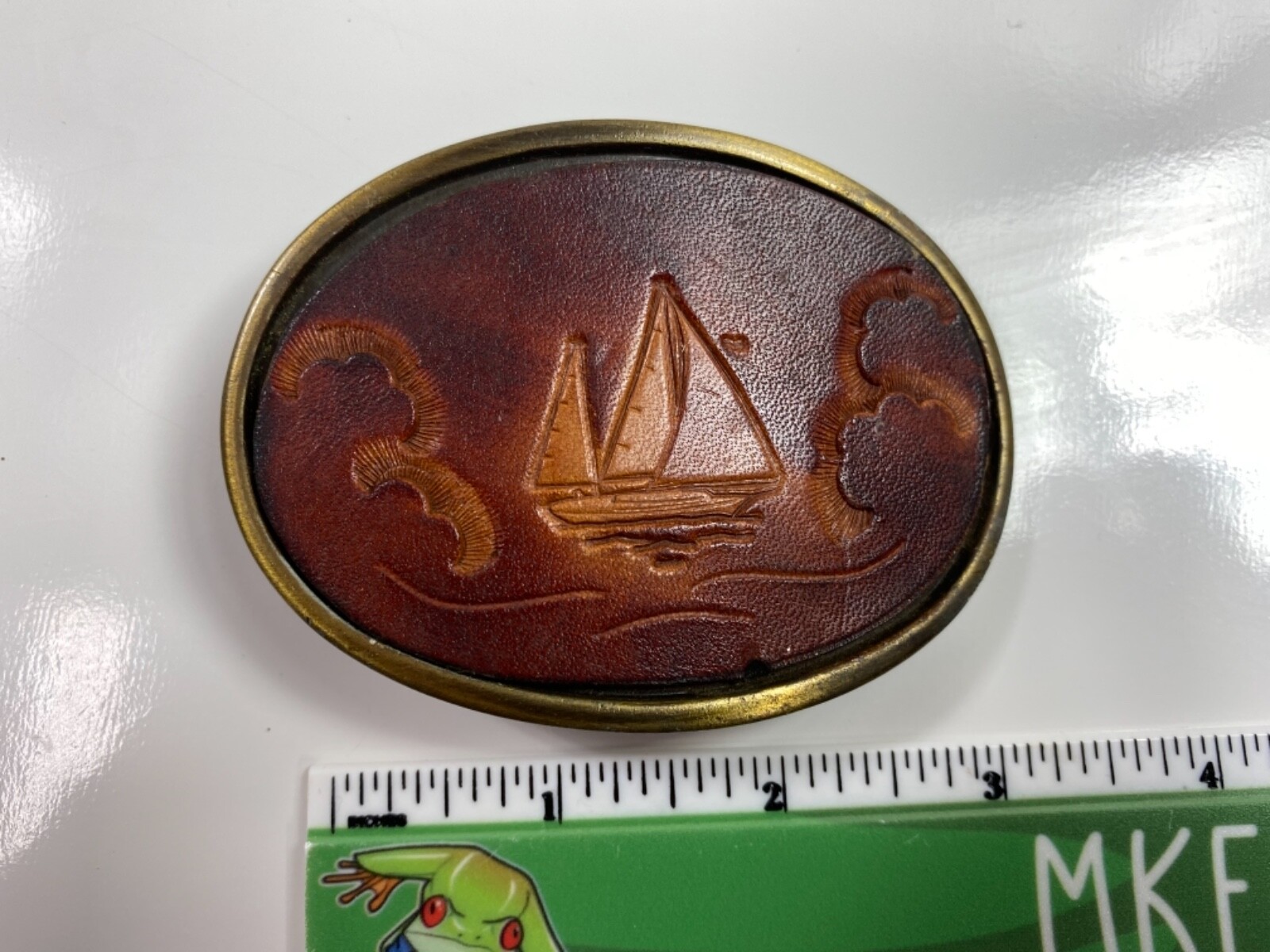 VINTAGE ANTIQUE brass and leather BUCKLE cutter ship sailboat nautical boat