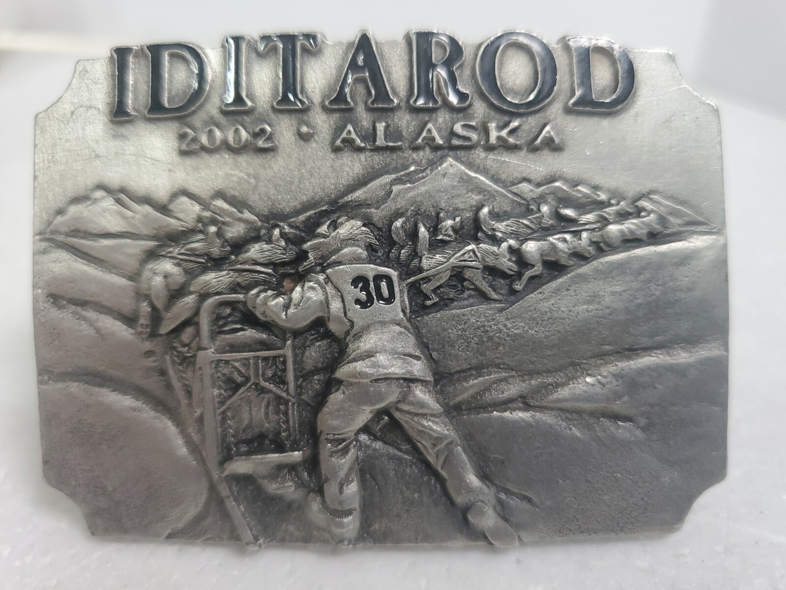 Official 2002 Iditarod Trail metal belt buckle