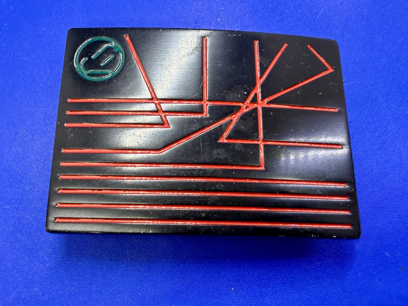 Unknown to me! Geometric Abstract Lines Red Over a Black Enamel Belt Buckle
