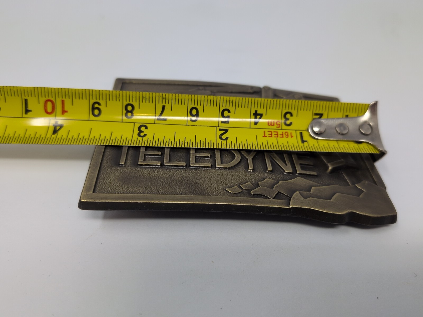 Vintage Teledyne Belt Buckle Brass Excavator Jackhammer Logo Construction