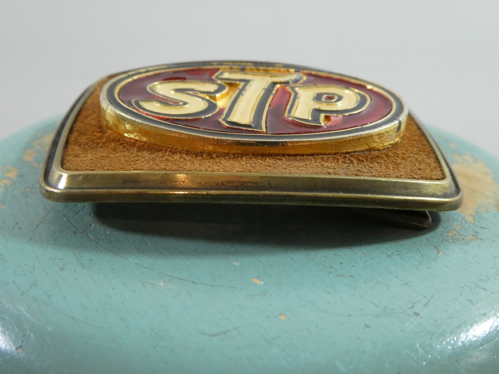 STP Motor Oil Company Belt Buckle 1979 Raintree Enamel Metal Men&rsquo;s Advertisment