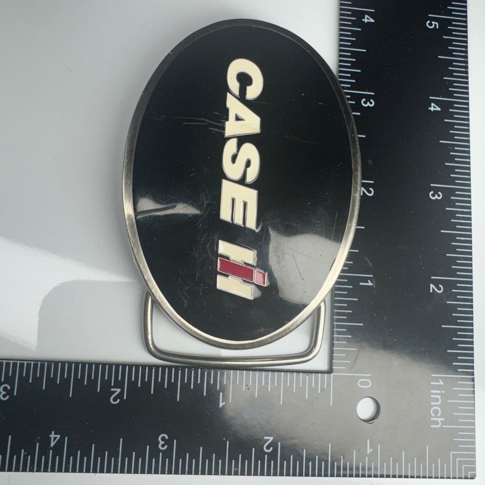 CASE IH Licensed Product Oval Belt Buckle Black Silver Tone CNH America LLC