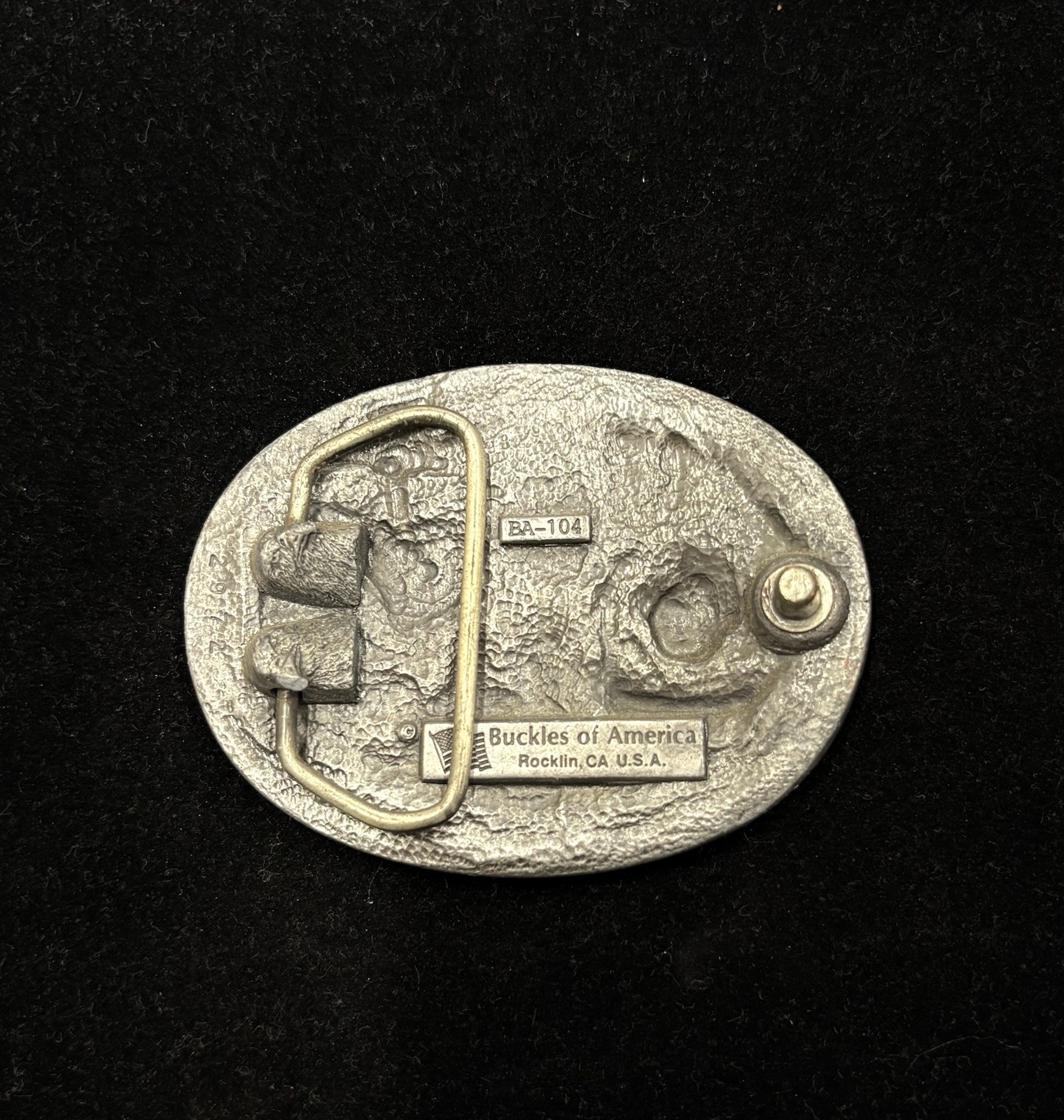 Vintage USMC belt buckle features red enamel background “First to Fight” RARE