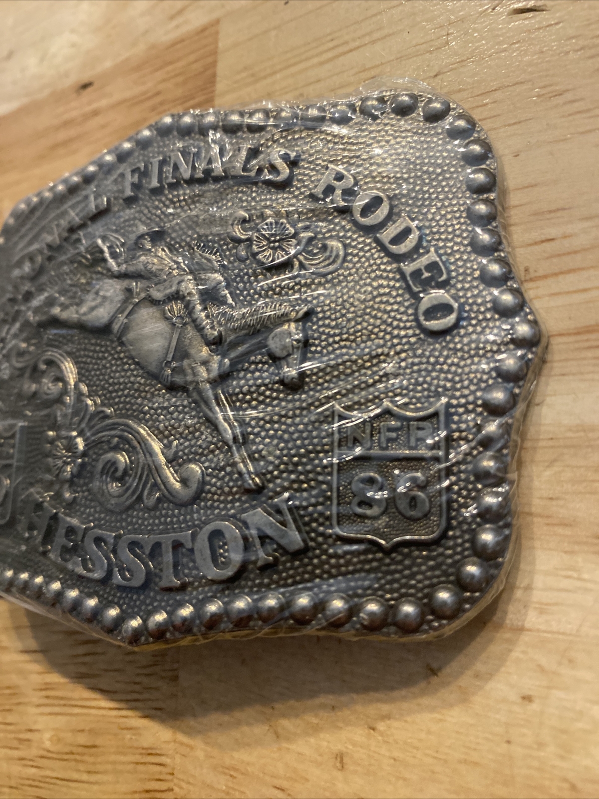 Hesston Vintage Rodeo Belt Buckle 1986 METAL Original Wrap National Finals NFR