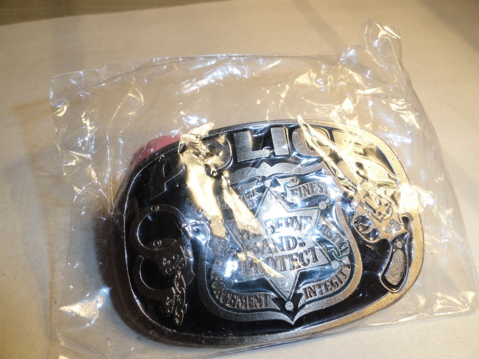 VINTAGE 1985 GREAT AMERICAN BUCKLE CO. USA. POLICE WE SERVE & PROTECT PREOWNED