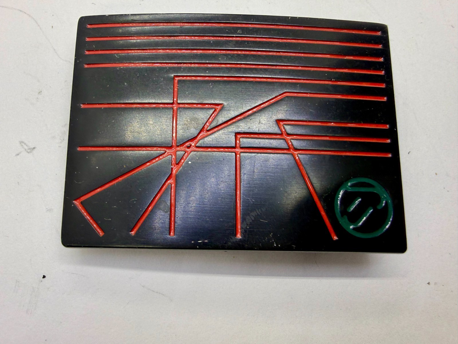 Unknown to me! Geometric Abstract Lines Red Over a Black Enamel Belt Buckle