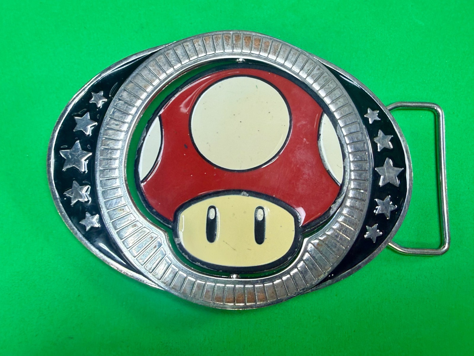Nintendo Super Mario Bros Game Spinning Mushroom Reversible Novelty Belt Buckle