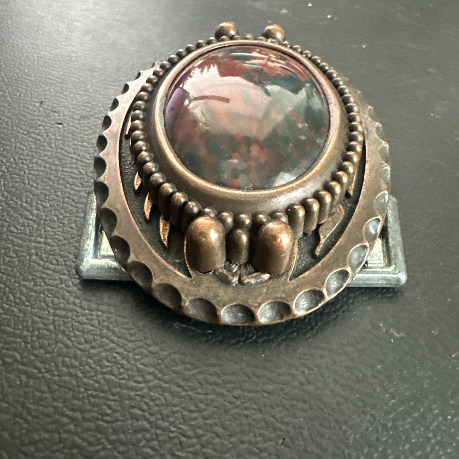 vtg ornate oval belt buckle With polished red & Green Center stone Agate?