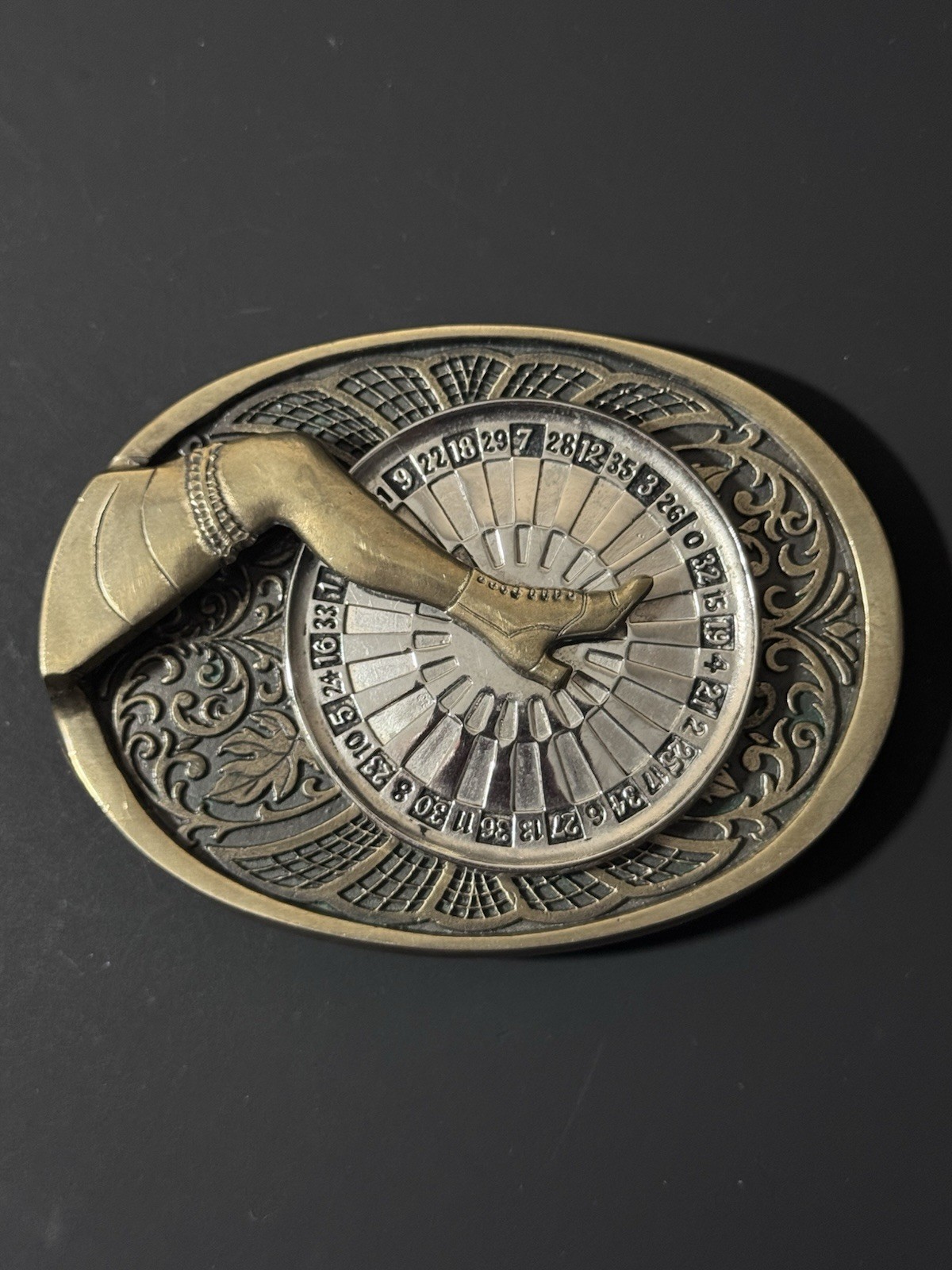 Vintage The Gal Leg Spinning Roulette Wheel Belt Buckle